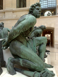 A photo from the Louvre of a buff statue